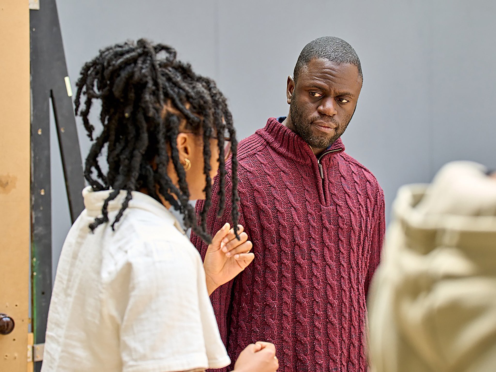 Craig directs actor Dayo Koleosho during rehearsals for ‘Jitney’ at the Old Vic