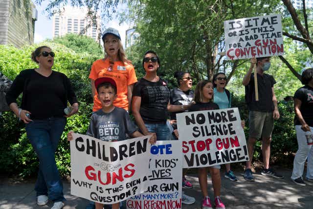 <p>File: Protesters chant slogans against the National Rifle Association annual meeting </p>