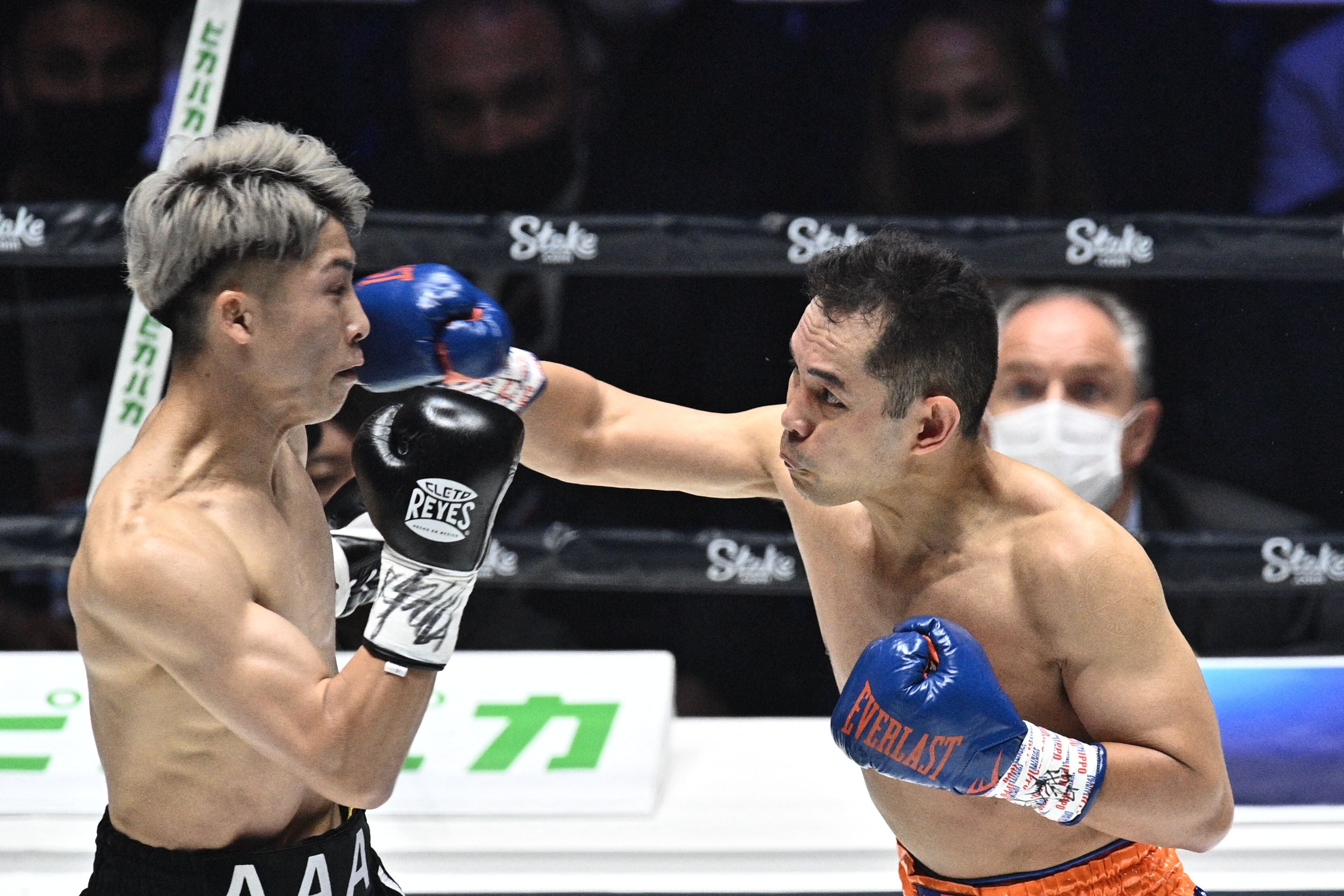 Nonito Donaire (right) was dropped late in Round 1 and finished in Round 2