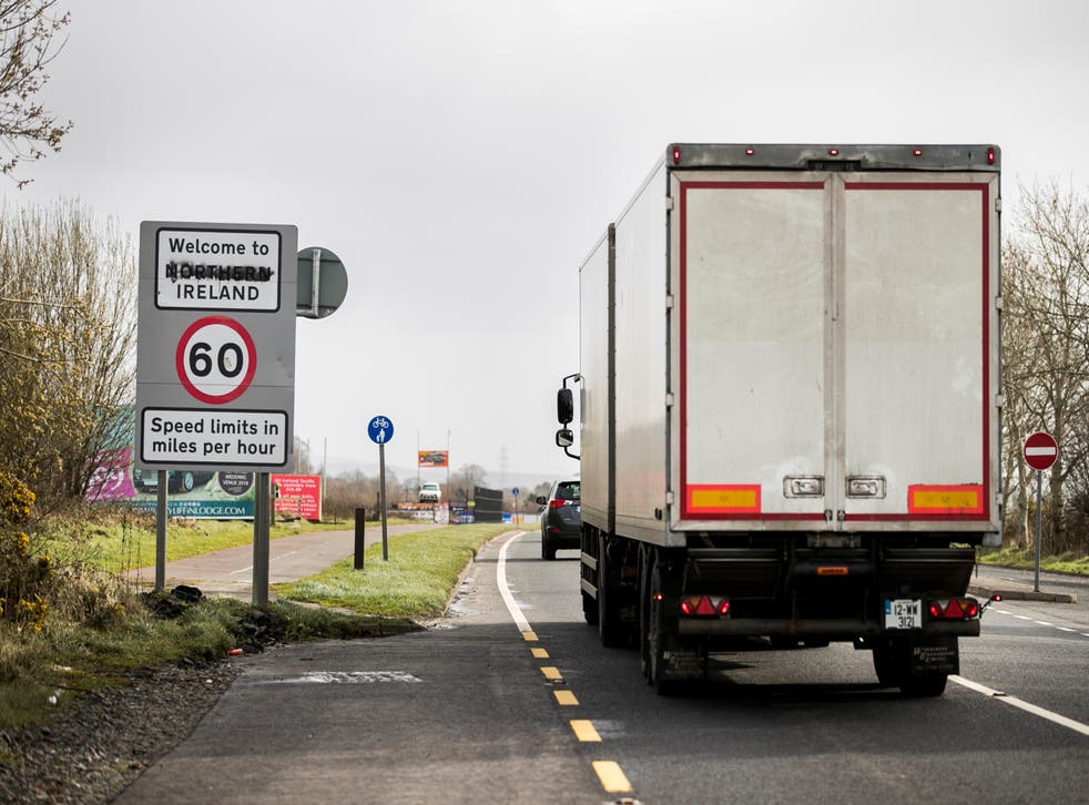 <p>A lorry crosses the border from the Republic of Ireland to Northern Ireland on the Buncrana Road outside Londonderry.  (Liam McBurney/PA)</p>