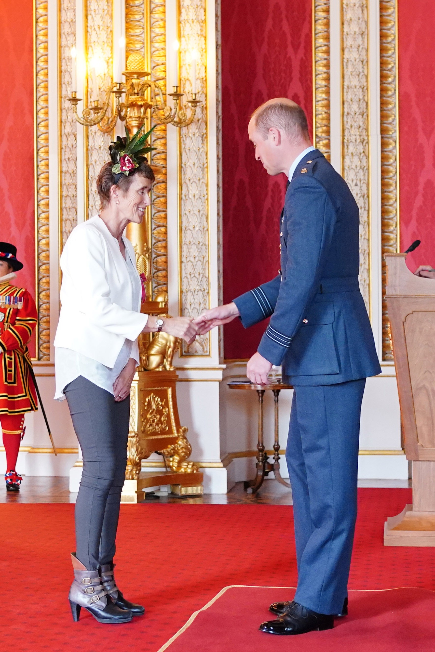 Karen Almond is made an MBE by the Duke of Cambridge at Buckingham Palace (Dominic Lipinski/PA)