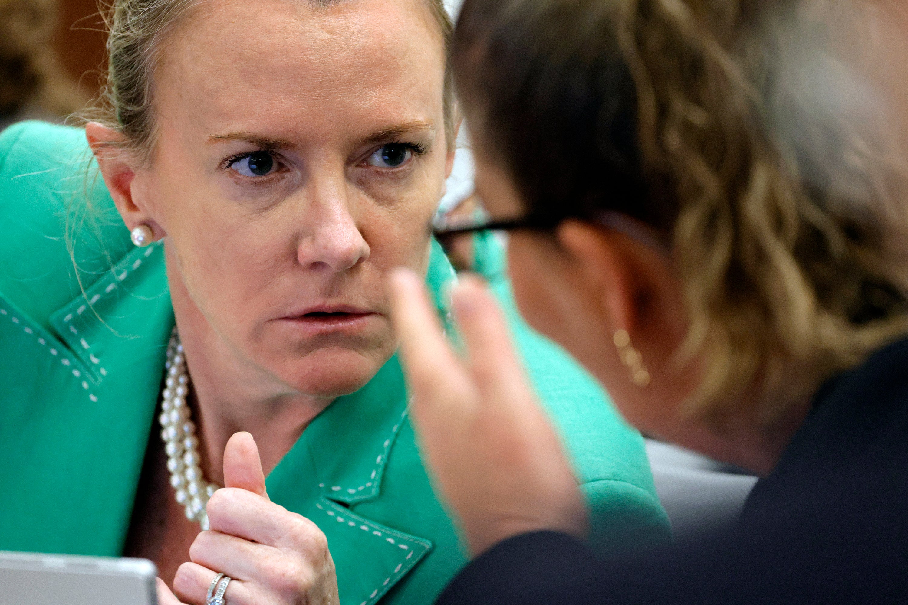 Assistant Public Defender Melisa McNeill, left, speaks with Assistant Public Defender Nawal Bashimam during jury selection in the penalty phase of the trial of Marjory Stoneman Douglas High School shooter Nikolas Cruz