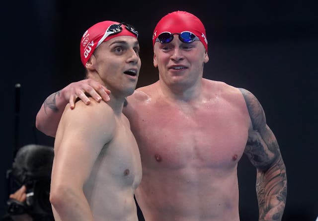 James Guy (left) will travel to Budapest without long-term team-mate Adam Peaty (Adam Davy/PA)