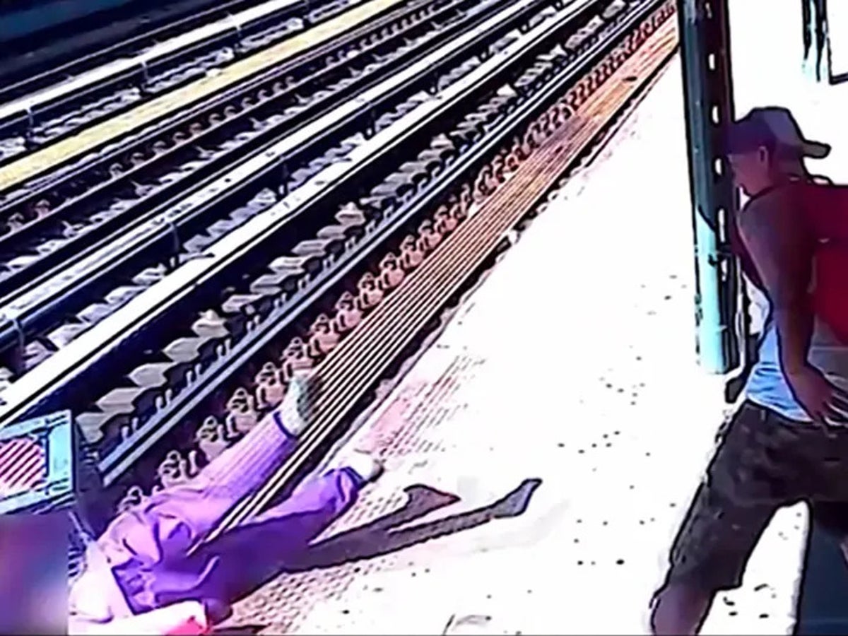 Man filmed throwing woman onto New York subway tracks in unprovoked attack