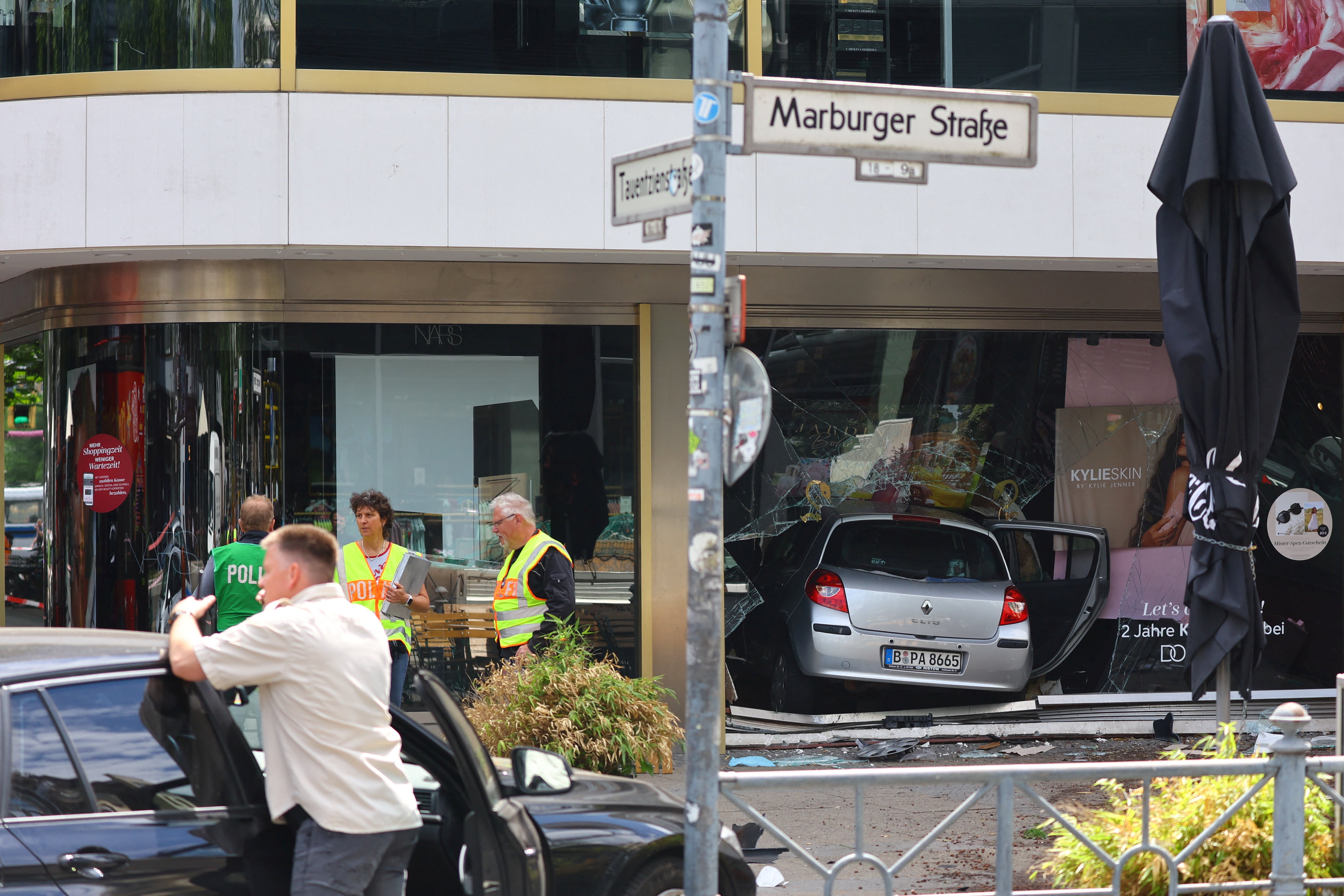 View of the car that crashed into a group of people before hitting a storefront at Tauentzienstrasse in Berlin