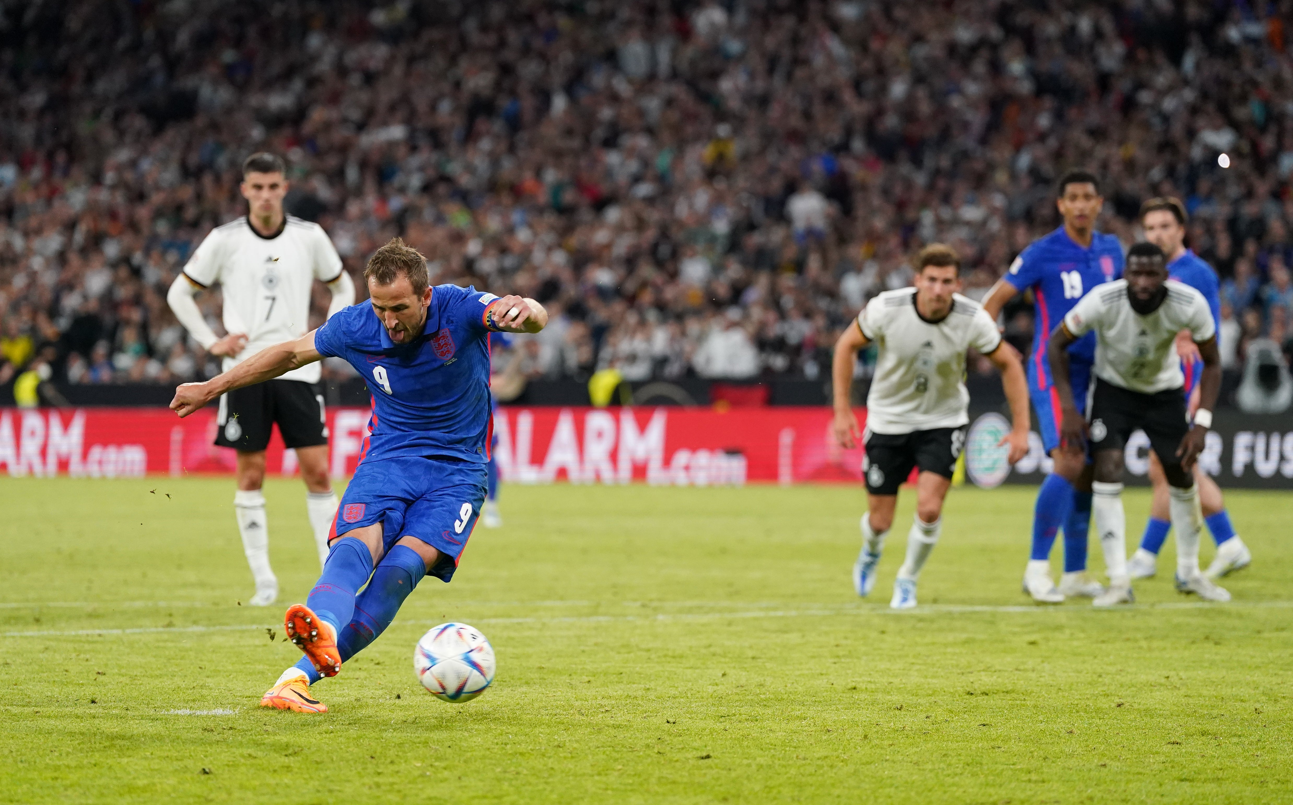 Harry Kane converts from the spot against Germany (Nick Potts/PA).