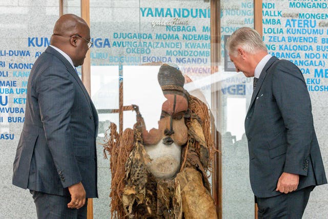 <p>Belgium’s King Philippe returns a traditional mask to Congo president Felix Tshisekedi (left) in Kinshasa </p>