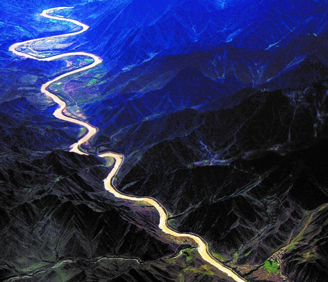 <p>The Lancang River flows through mountainous areas in Yunnan province</p>