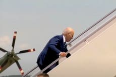 Joe Biden stumbles up stairs of Air Force One on way to California