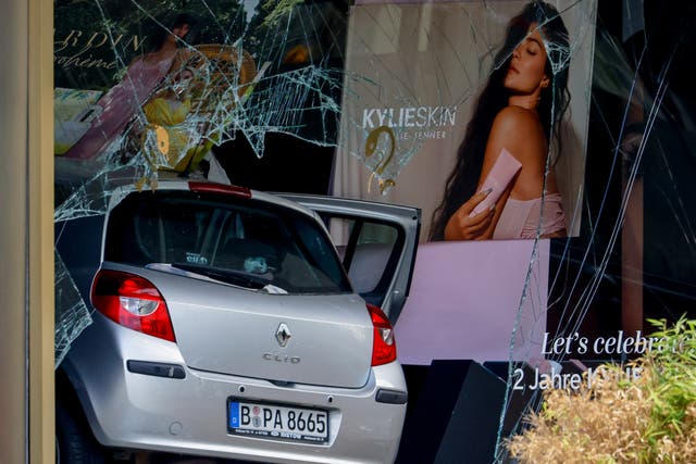 <p>The car smashed into a shop window after hitting people near Breitscheidplatz in Berlin, Germany,  on 8 June, 2022</p>