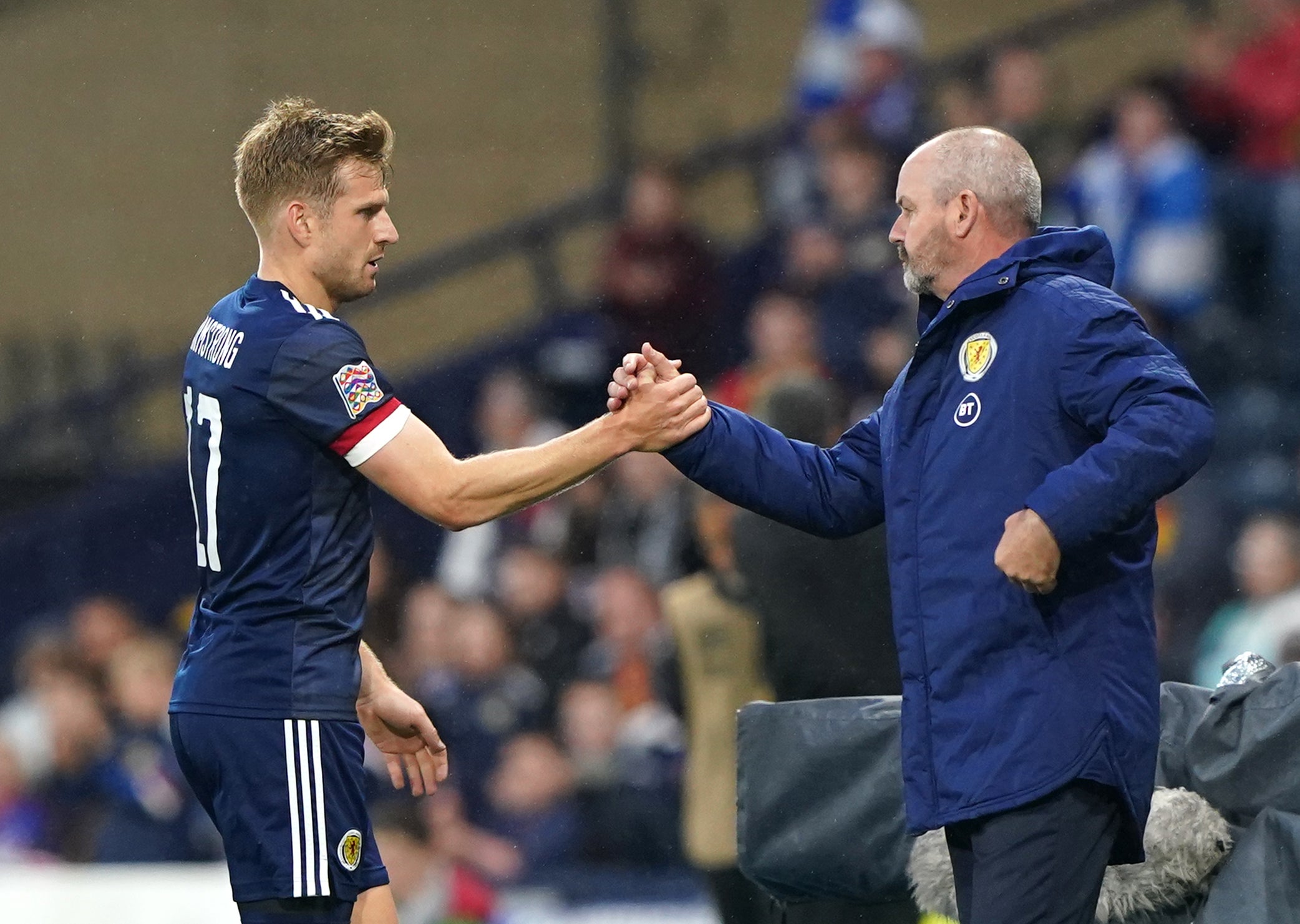 Stuart Armstrong and manager Steve Clarke (Andrew Milligan/PA)