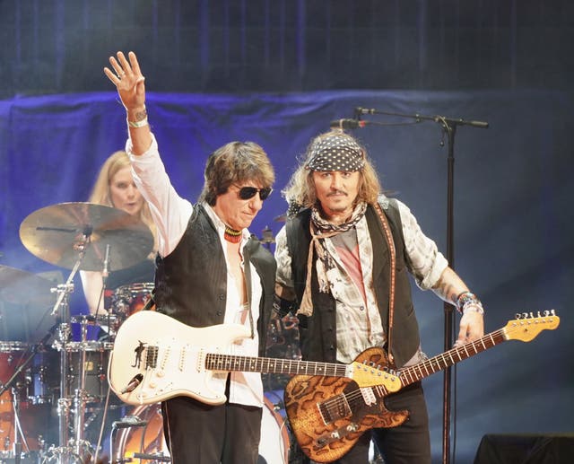 <p>Johnny Depp with Jeff Beck (Raph Pour-Hashemi/PA)</p>