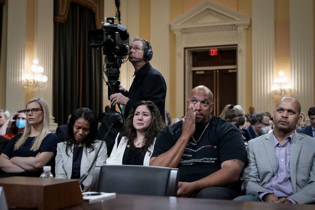 <p>US Capitol Police officer Harry Dunn, flanked by the widow of Brian Sicknick, at Thursday’s hearing</p>