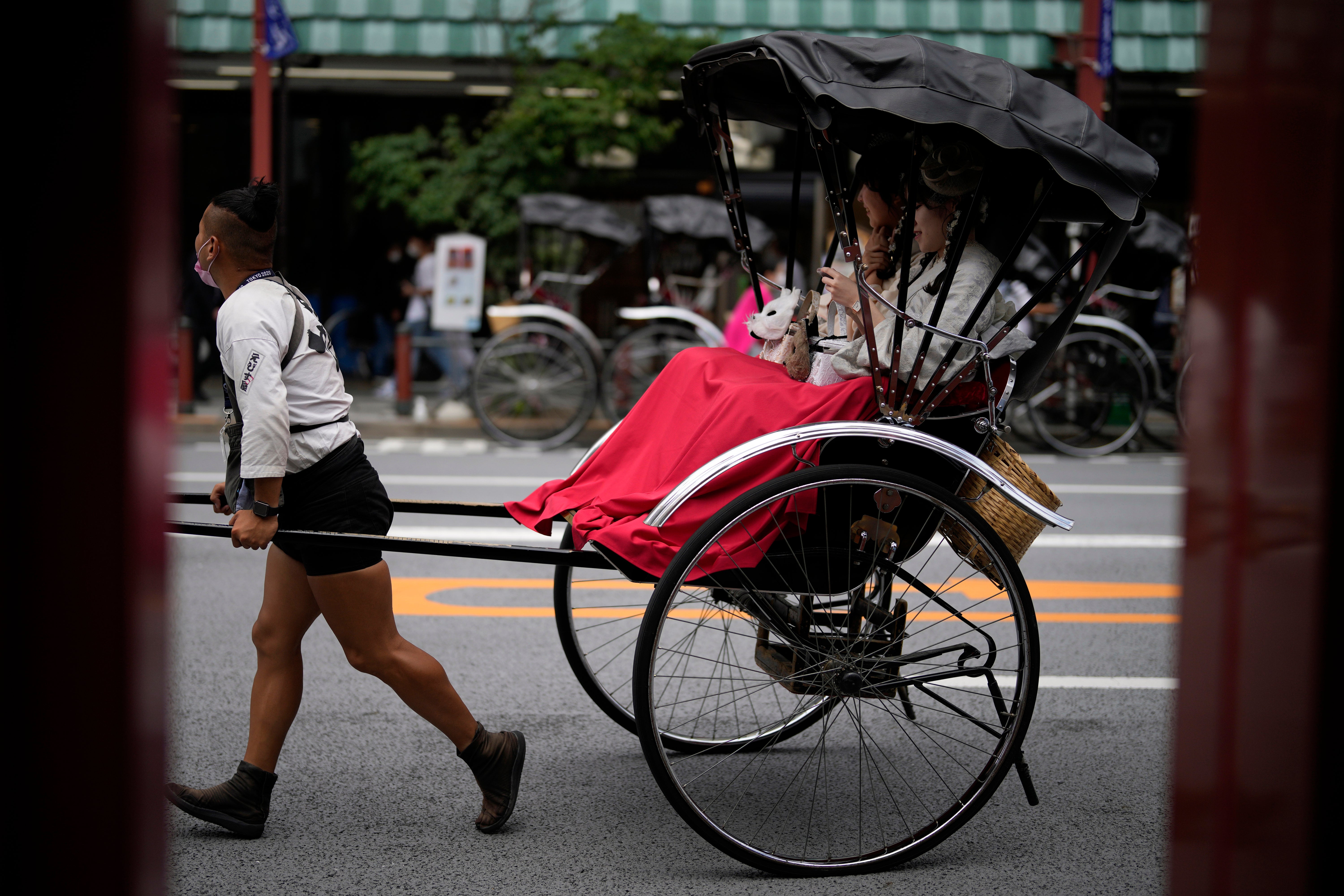 APTOPIX Virus Outbreak Japan Tourism