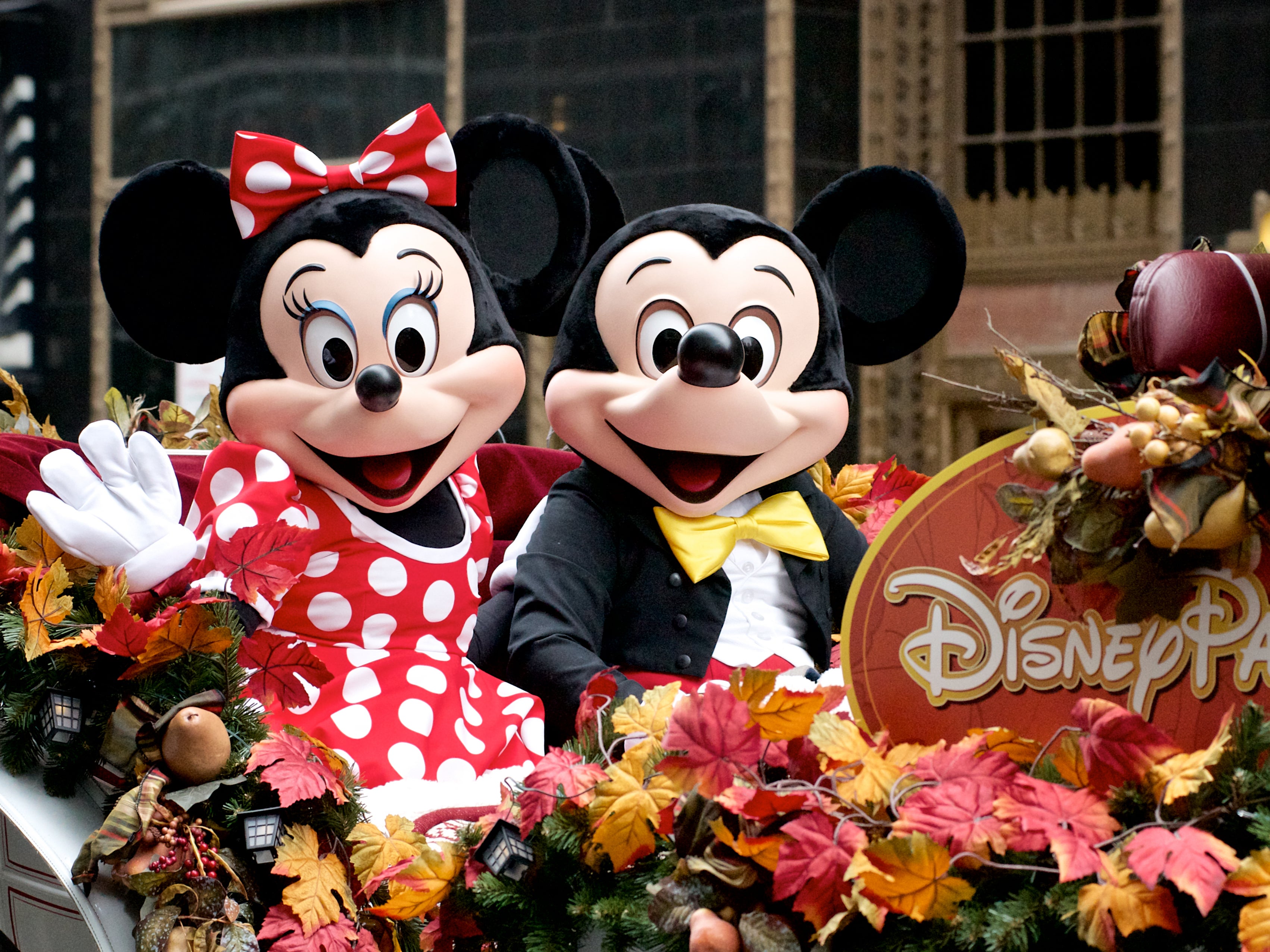 Disney adult' couple spark backlash after paying for Mickey Mouse  appearance over wedding food