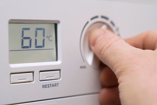 Households are cutting energy usage as bills rocket (Andrew Matthews/PA)