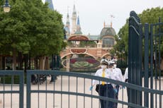 Visitors stopped from leaving Disneyland after person with Covid traced to Shanghai theme park