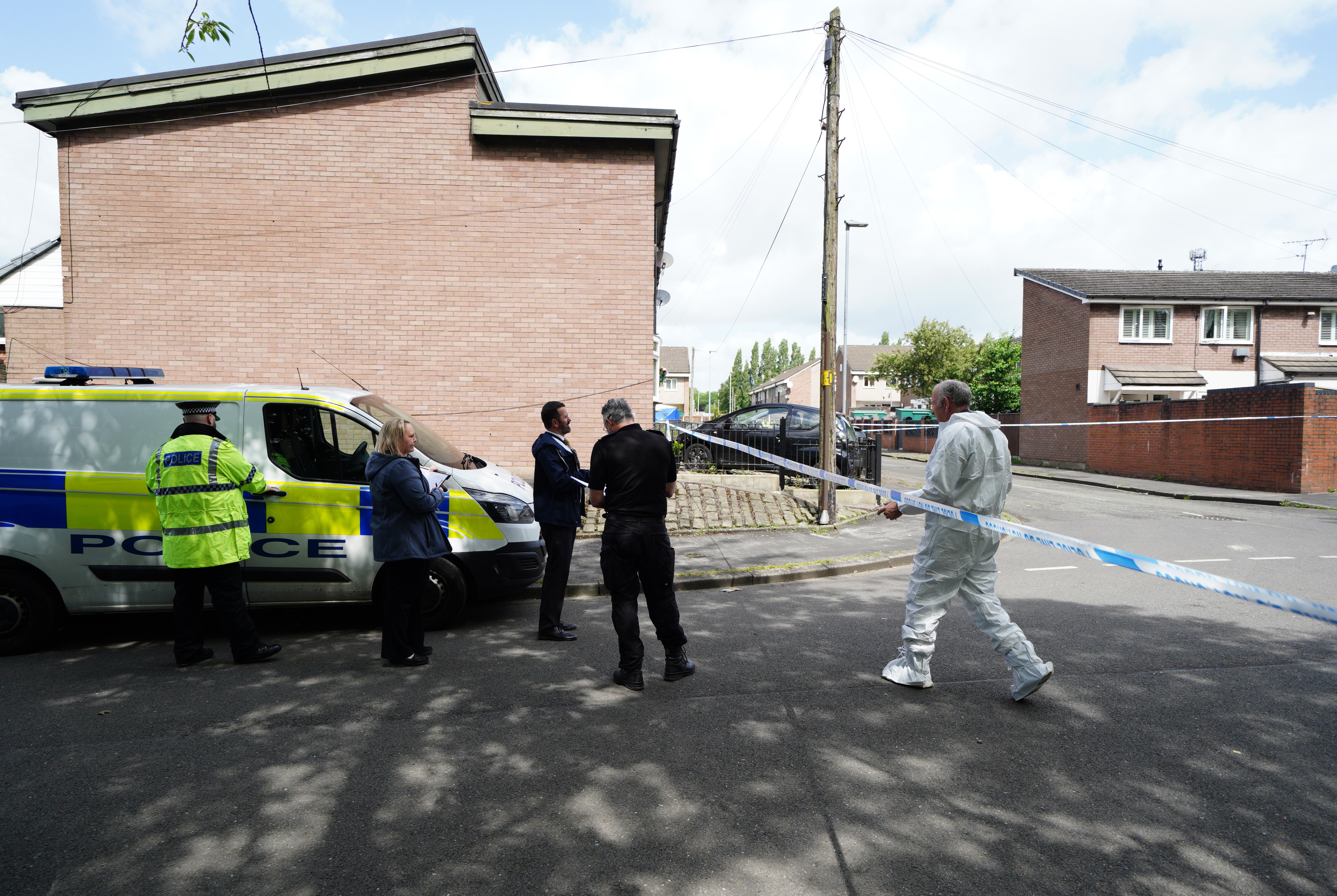 The scene in Bednal Avenue, Miles Platting, Manchester, following the domestic incident where a 14-year-old boy died and his mother was injured (Peter Byrne/PA)