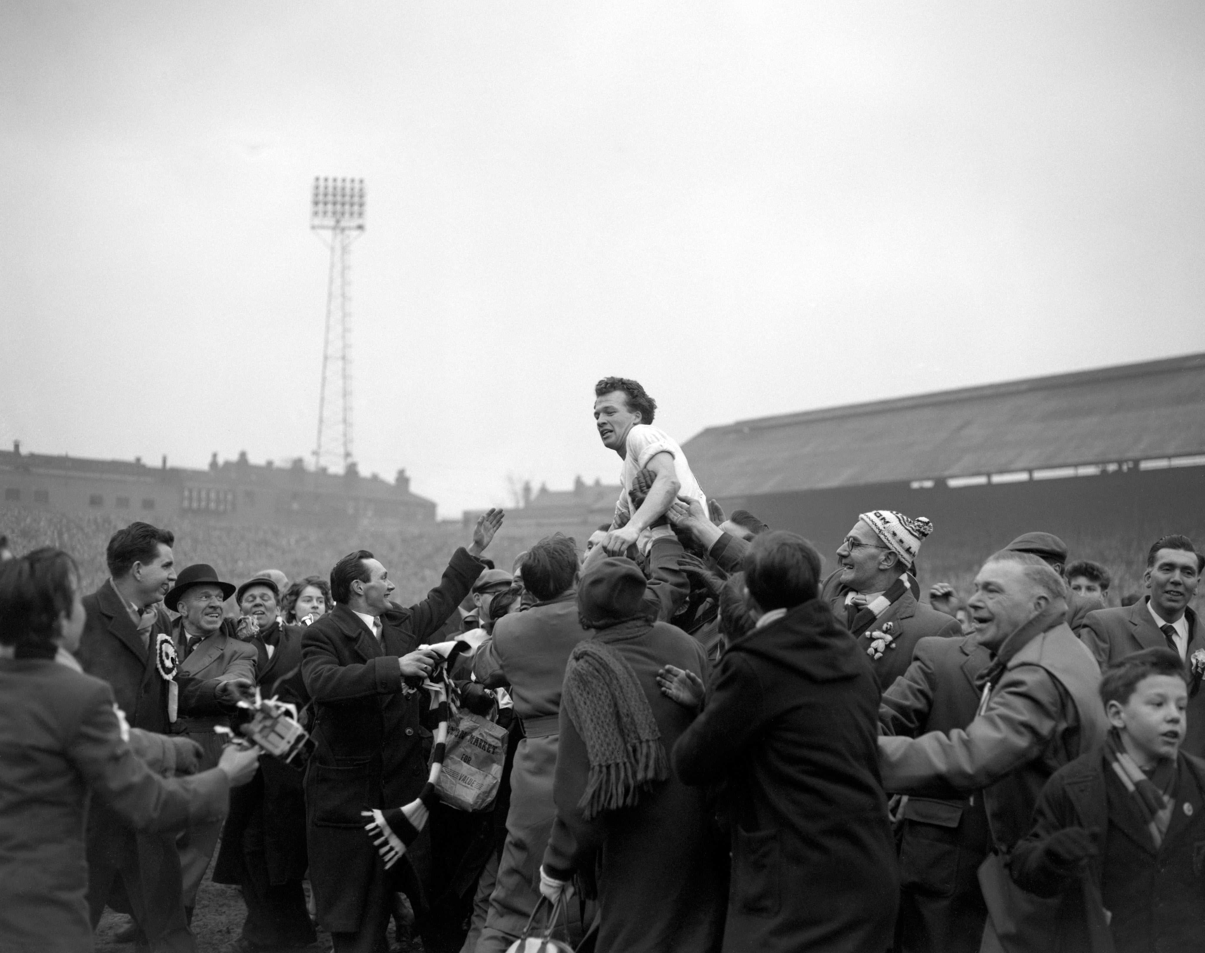 Billy Bingham is held aloft by fans after scoring the goal which sent Luton to the 1959 FA Cup final (PA).