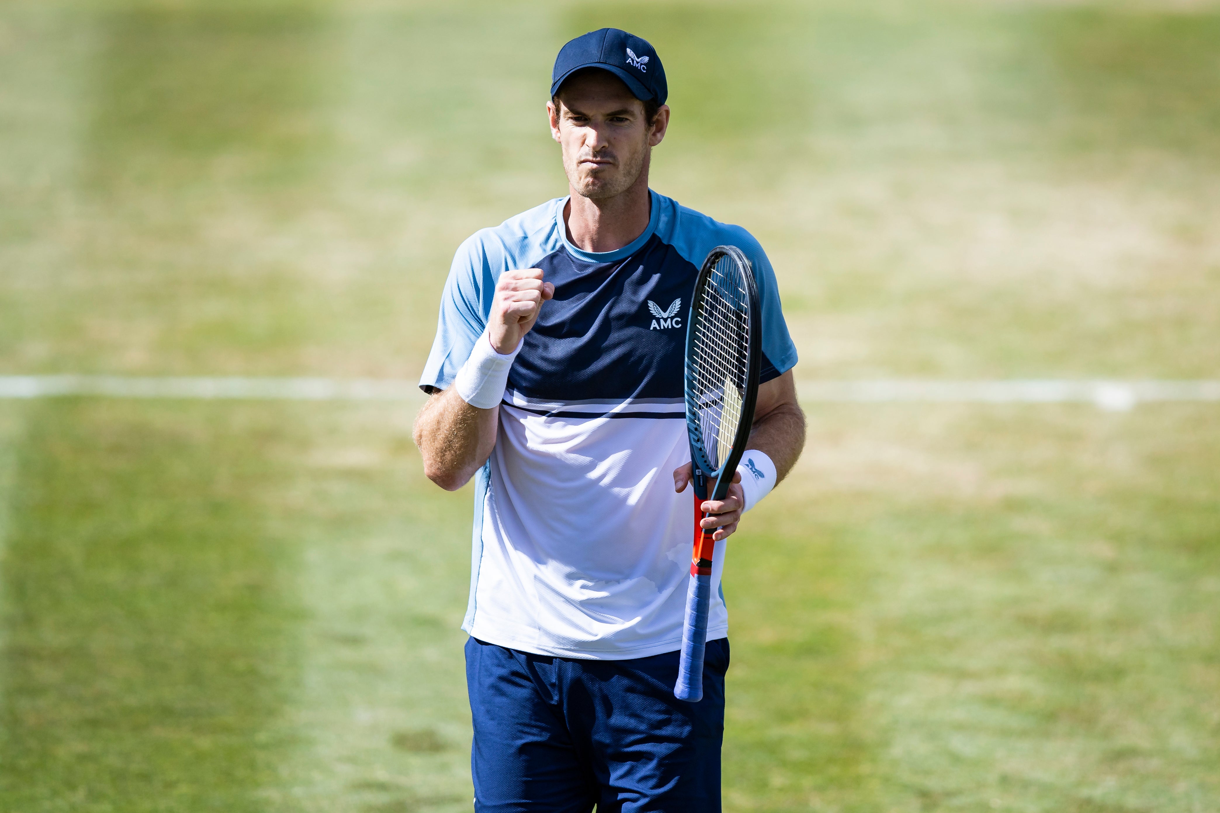 Andy Murray celebrates after winning a point against Stefanos Tsitsipas