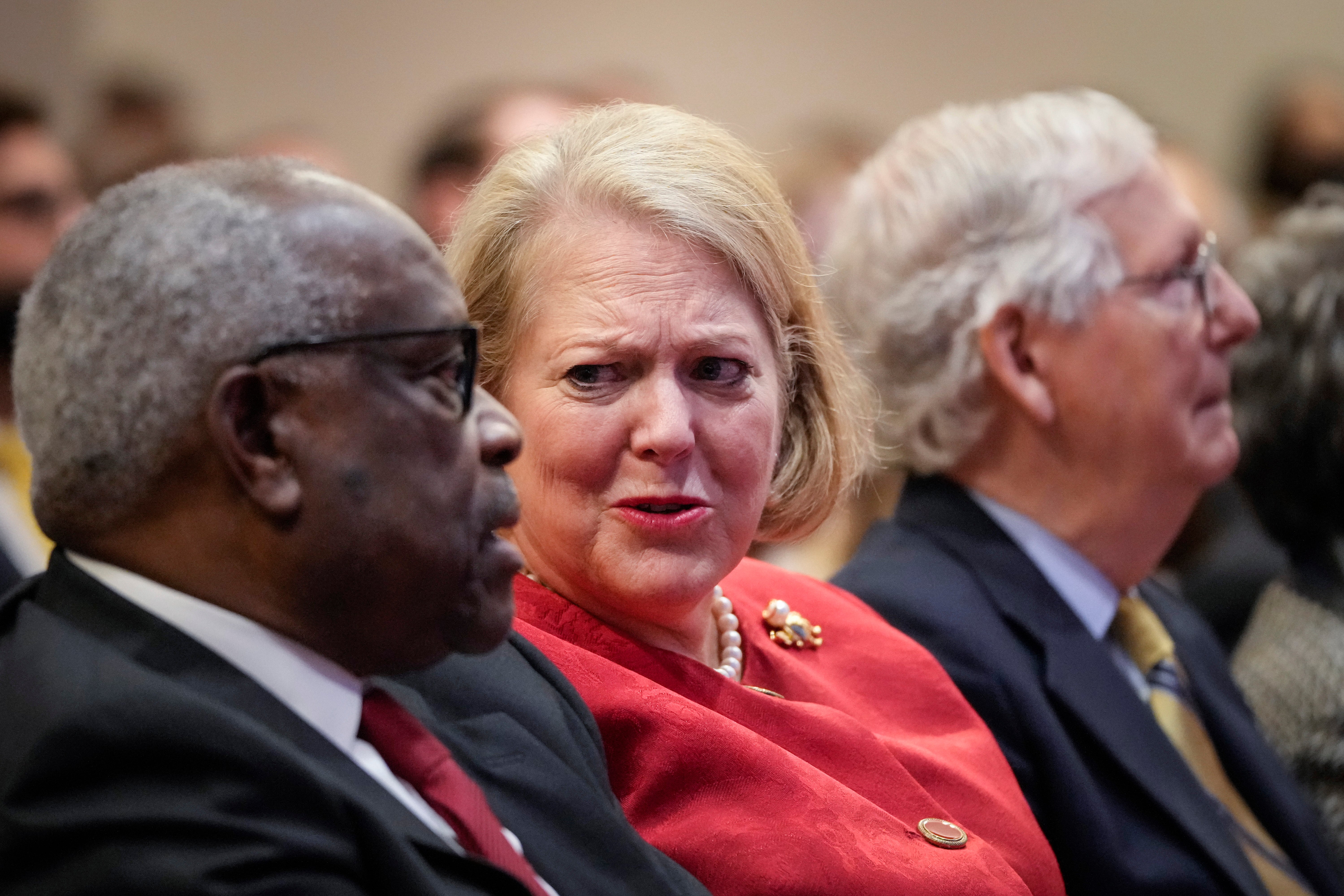 Clarence Thomas with his wife Ginni Thomas (centre)