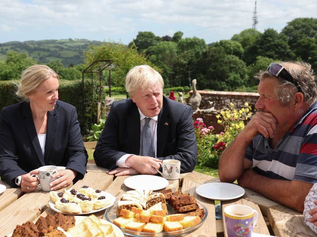 <p>Boris Johnson and Tory candidate Helen Hurford (left) at Ditchetts Farm in the Tiverton and Honiton constituency </p>