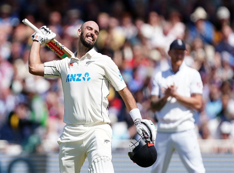 <p>New Zealand’s Daryl Mitchell celebrates after reaching a century on day two of the second Test against England at Trent Bridge</p>