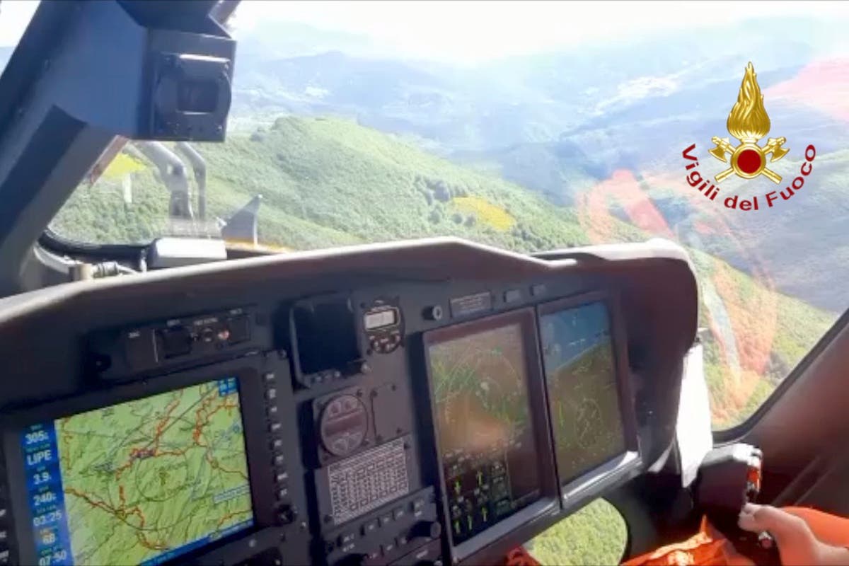 Italy locates 7 bodies at scorched crash site of helicopter Italy locates 7 bodies at scorched crash site of helicopter