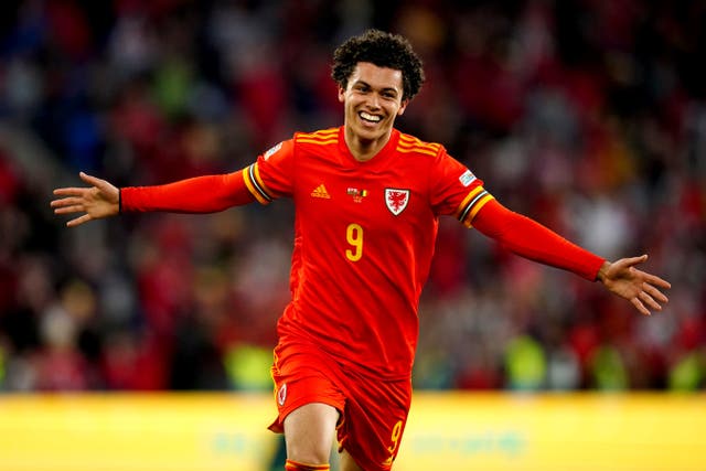 Brennan Johnson celebrates scoring Wales’ equaliser in the 1-1 Nations League draw with Belgium (David Davies/PA)