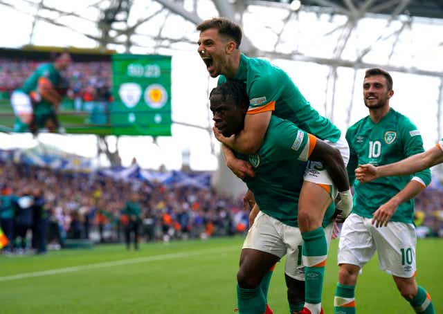 Republic of Ireland striker Michael Obafemi (left) celebrates with his team-mates after his stunning strike against Scotland (Niall Carson/PA)