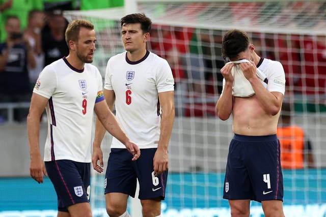 <p>Harry Kane, Harry Maguire and Declan Rice after England’s Nations League defeat against Hungary </p>