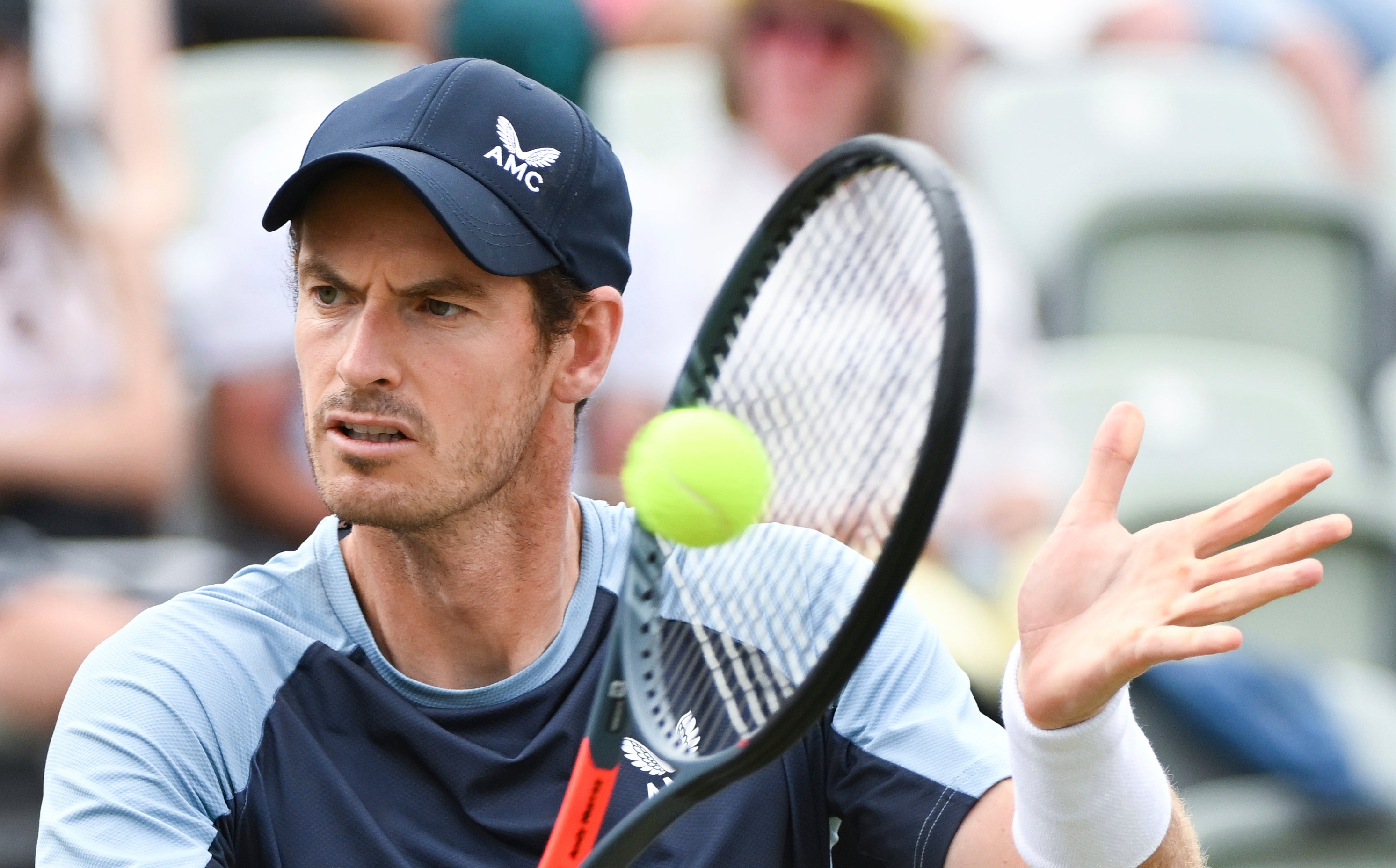 Andy Murray plays a return to Italy's Matteo Berrettini