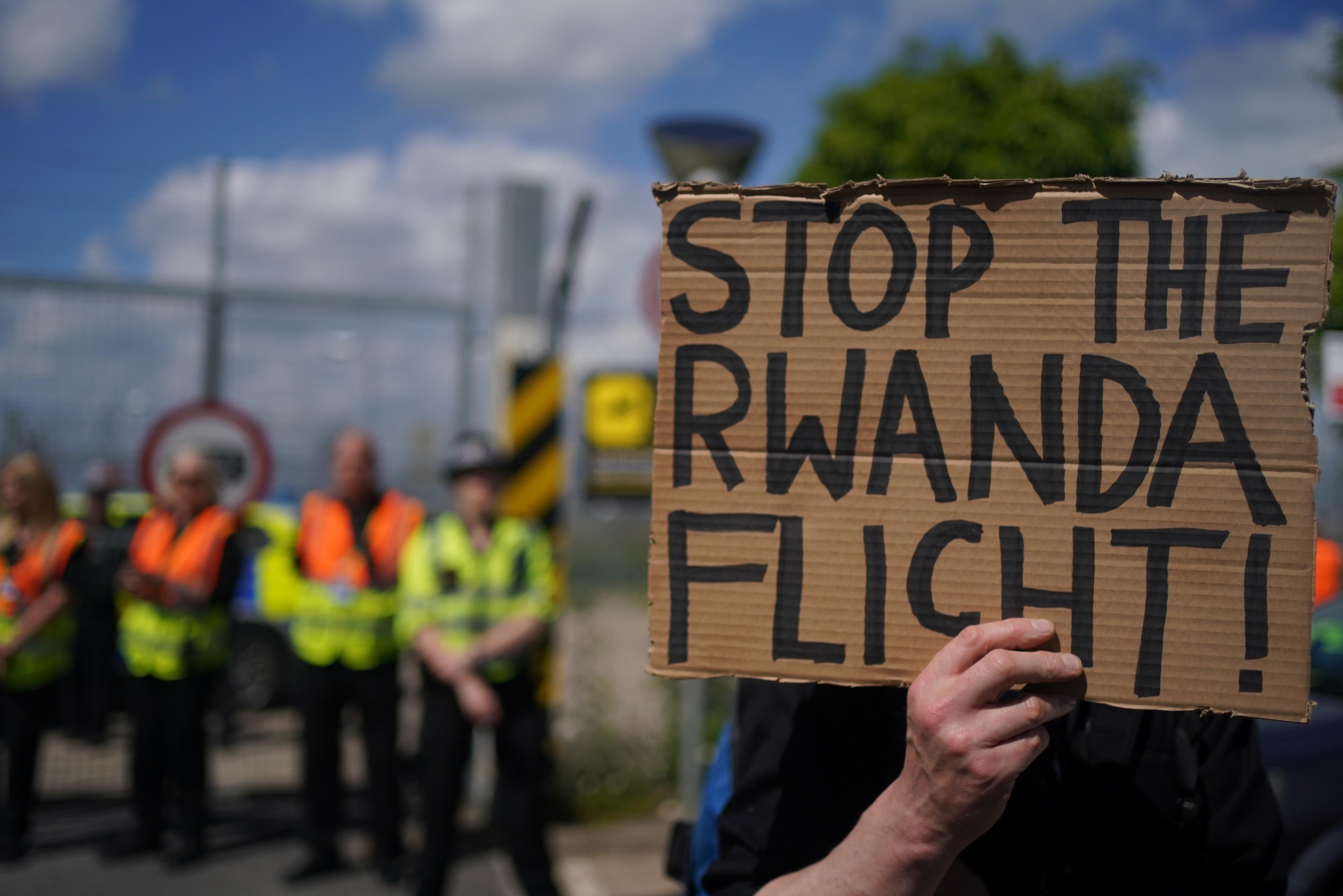 Demonstrators at a removal centre at Gatwick protest against plans to send migrants to Rwanda (Victoria Jones/PA)