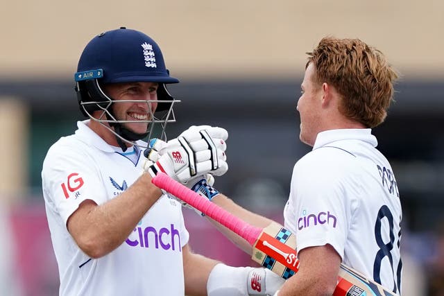 <p>Centuries by Root, left, and Pope give England hope in this second Test </p>