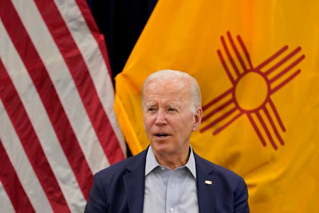 <p>President Joe Biden speaks during a briefing in Santa Fe on 11 June</p>