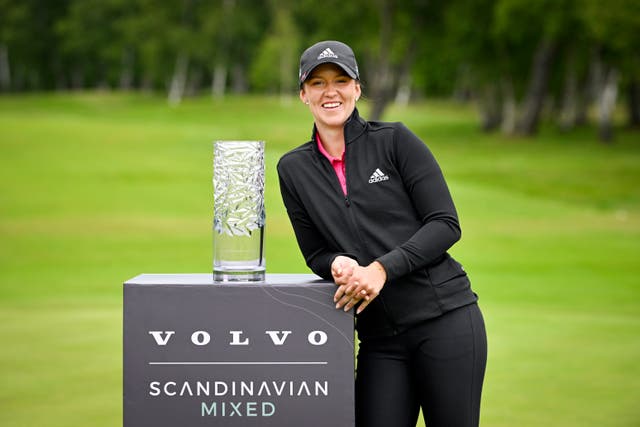 Linn Grant poses with the trophy after winning the Scandinavian Mixed (Pontus Lundahl/TT via AP)