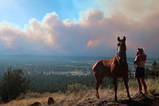 Western wildfires force evacuations in Arizona, California