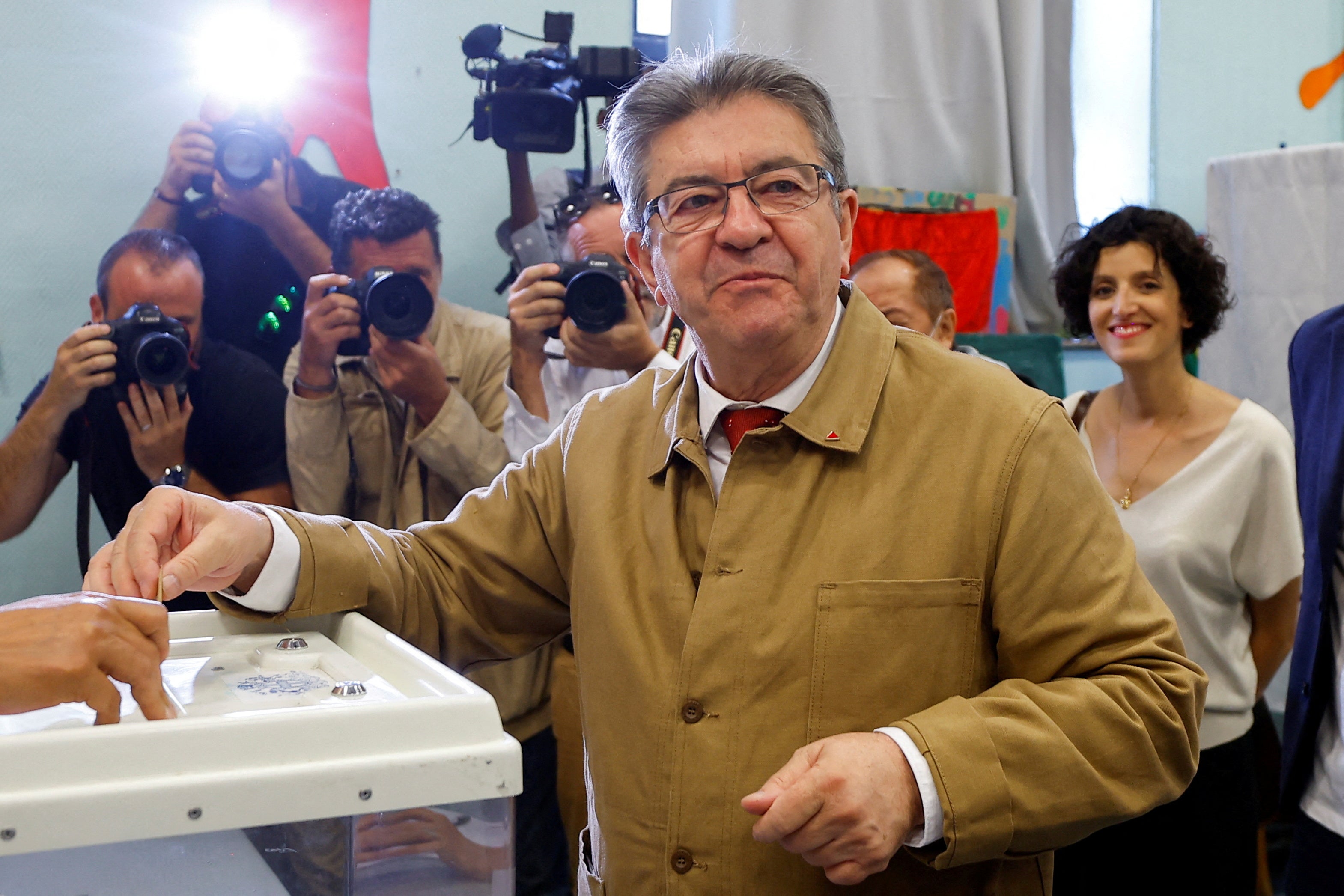 Jean-Luc Melenchon casts his vote in the first round of the parliamentary elections at a polling station in Marseille on Friday 12 June