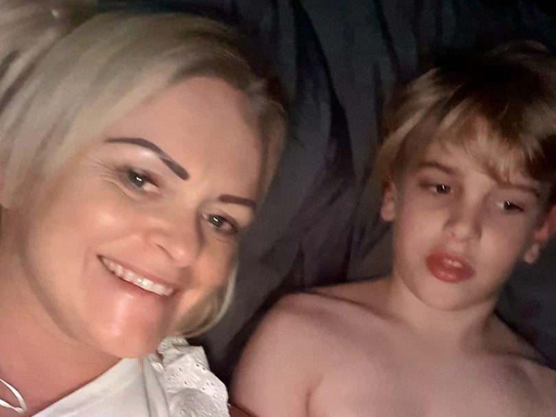 Archie, pictured with mother Hollie Dance, was left brain damaged after his family said he suffered an accident at home