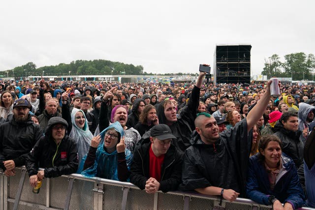 <p>Revelers at Download Festival in 2021</p>