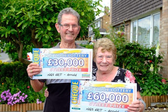 <p>Denise Bell, 71, and Alan Shaw, 74,  won a combined £90,000</p>