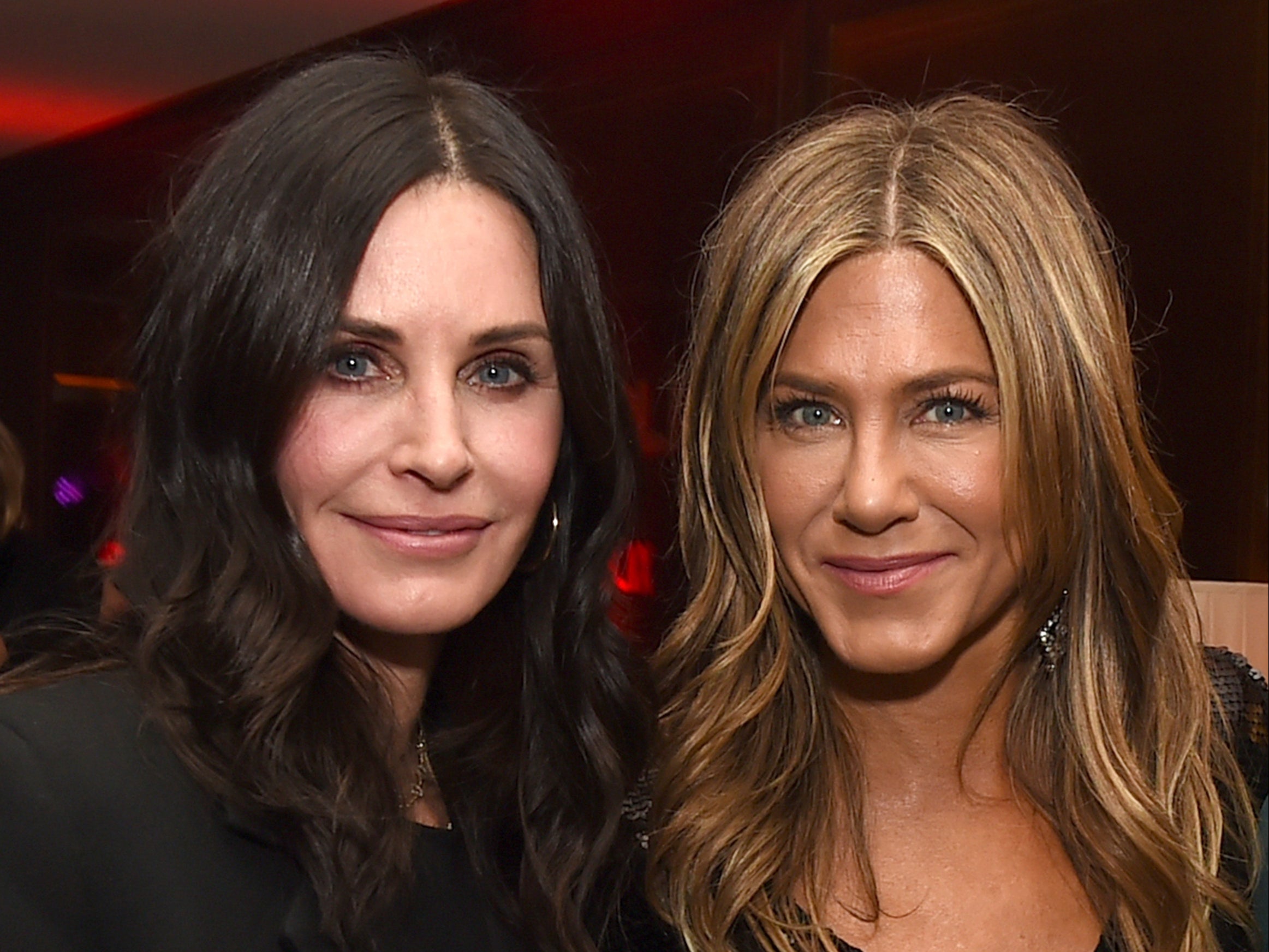 Courteney Cox (L) and Jennifer Aniston pose at the after party for the premiere of Netflix's ‘Dumplin’