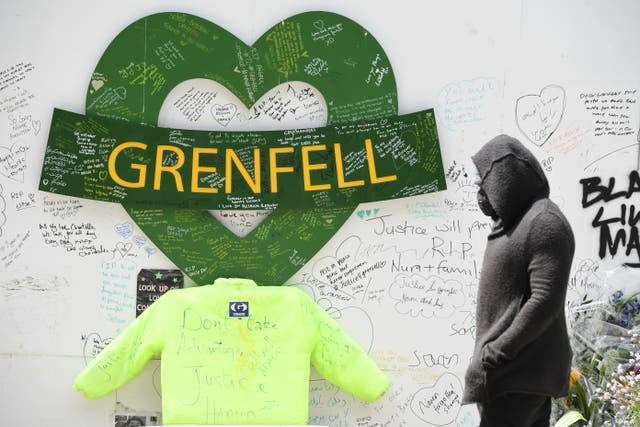 People at the Grenfell Memorial Community Mosaic (Kirsty O’Connor/PA)