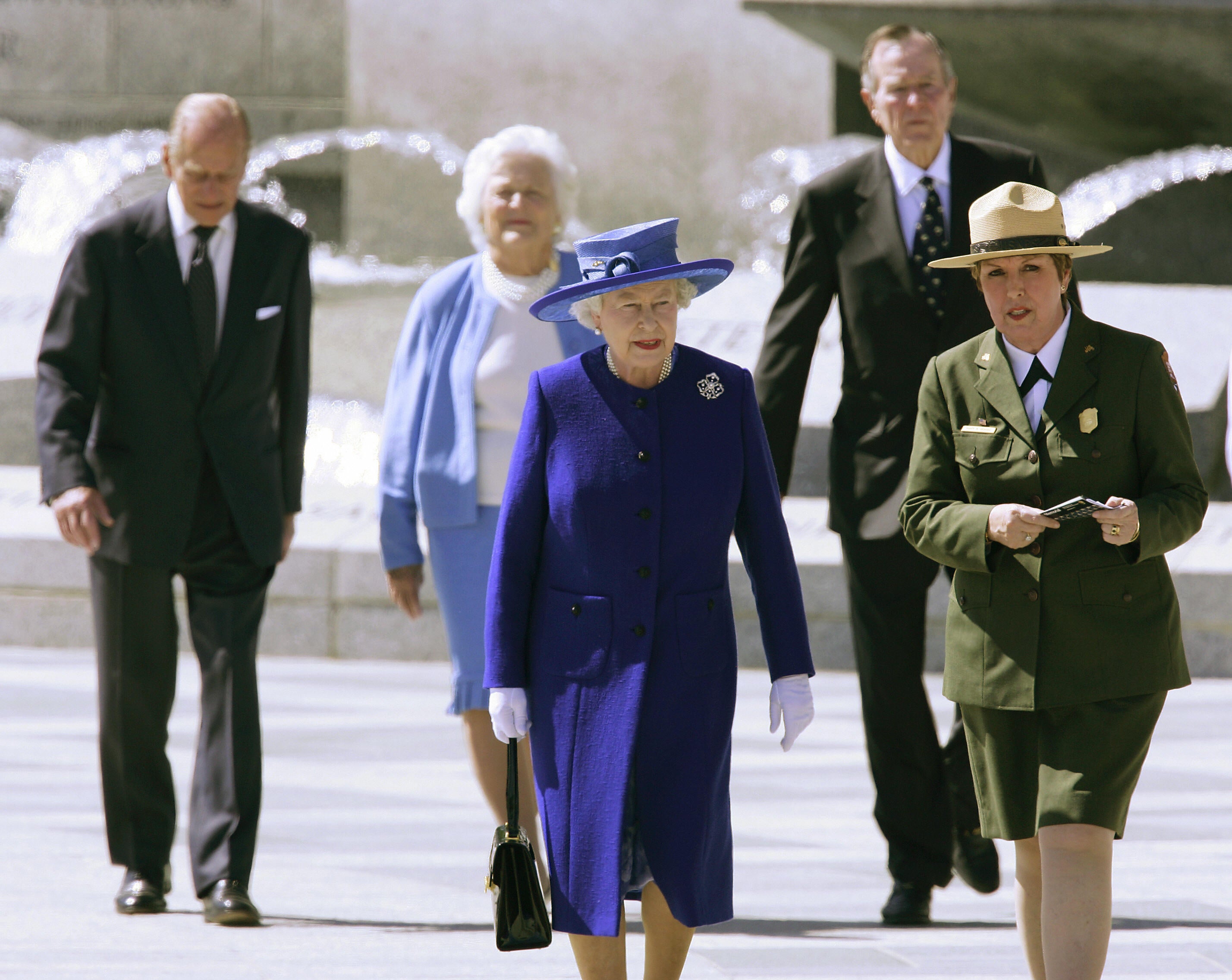The Queen and Prince Philip with former president George HW Bush, former first lady Barbara, and United States Park Service director Mary Bomaras, during a visit to the World War II Memorial in Washington DC, in May 2007