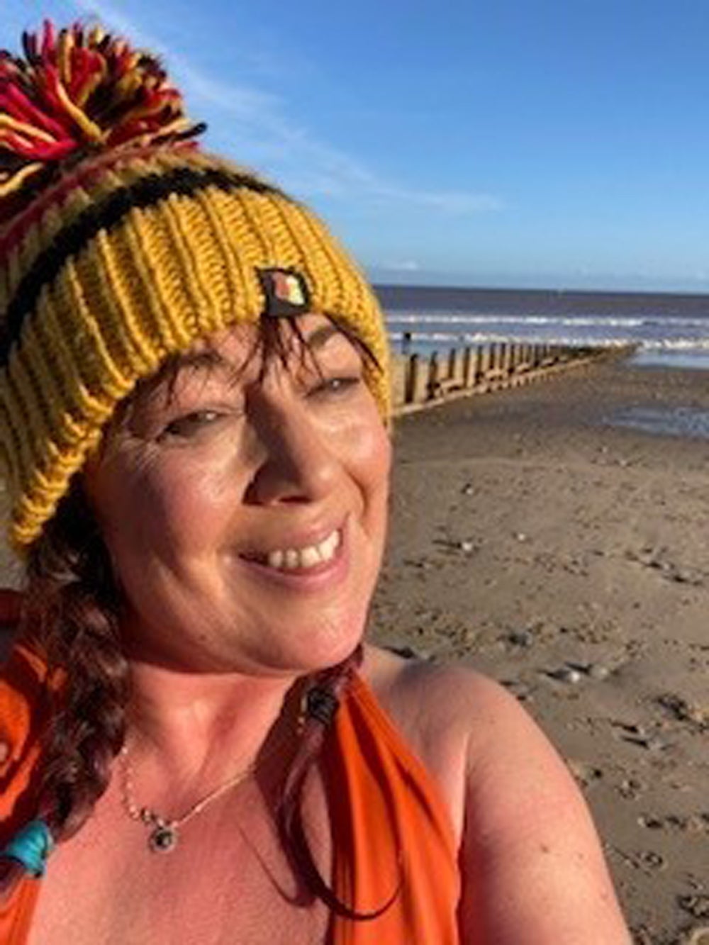 Claire Keable, 48, after a bracing January swim in the sea on Hornsea beach (Collect/PA Real Life)