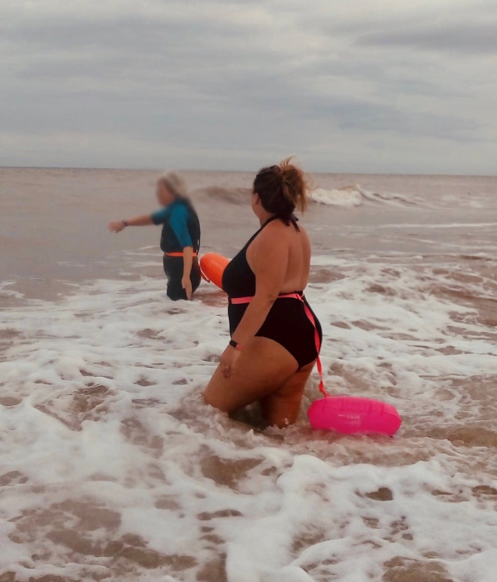 Claire Keable, 48, taking the plunge in Hornsea beach in autumn 2021 (Collect/PA Real Life)