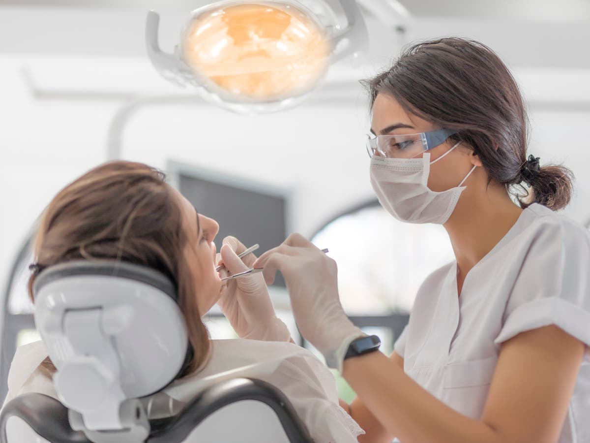 Woman diagnosed with menopause by dentist after GP &lsquo;ignored&rsquo; symptoms for years