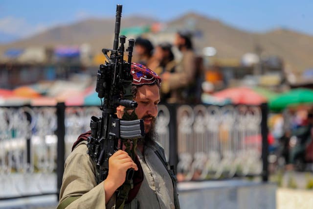 <p>A Taliban soldier seen near the Hazrat Zakaria Mosque in Kabul, Afghanistan</p>