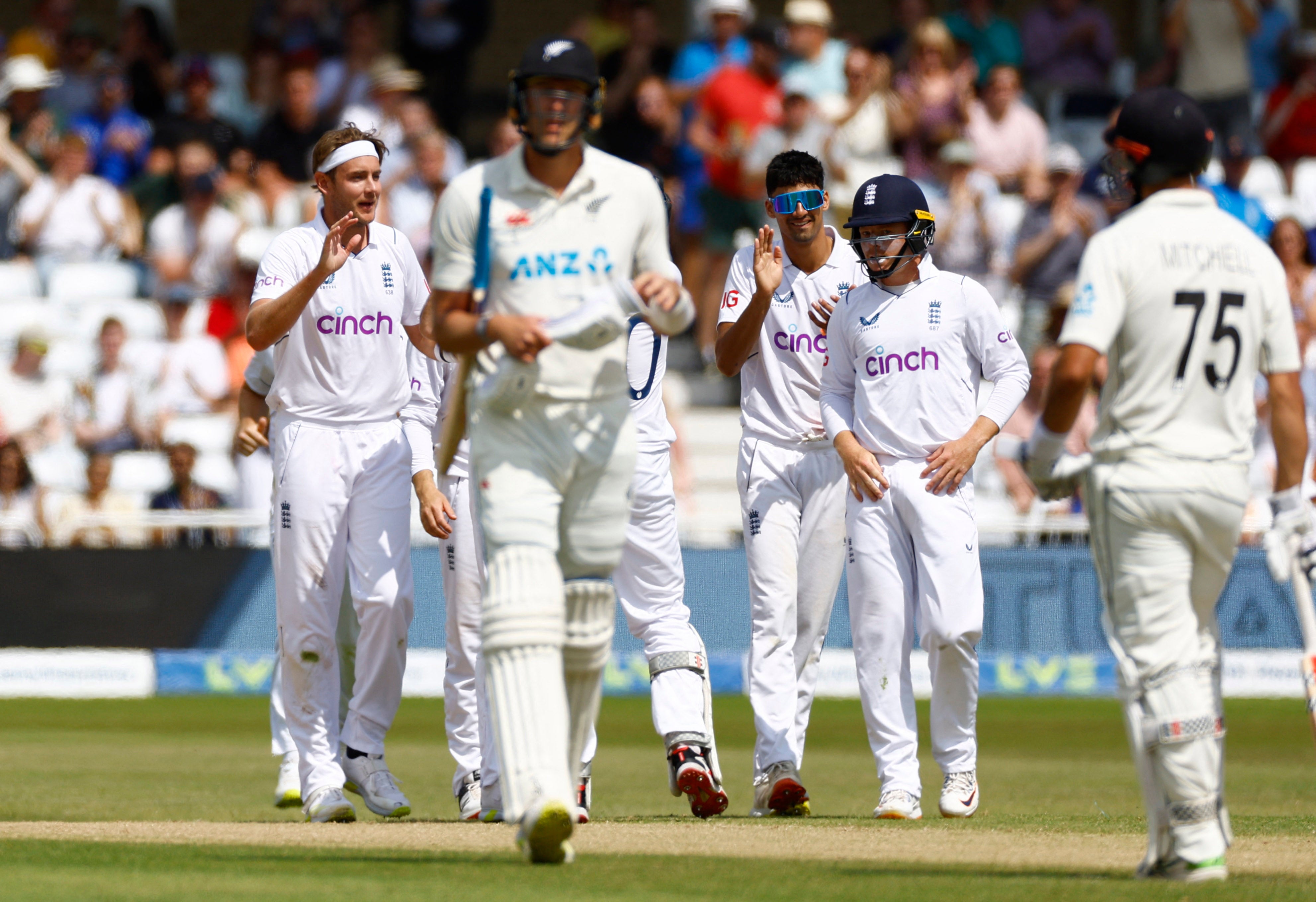 Kyle Jamieson walks away after falling to Stuart Broad