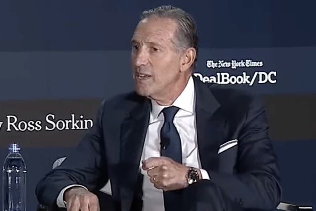 <p>Starbucks CEO Howard Schultz speaking on Monday at The New York Times’s DealBrook conference in Washington DC</p>